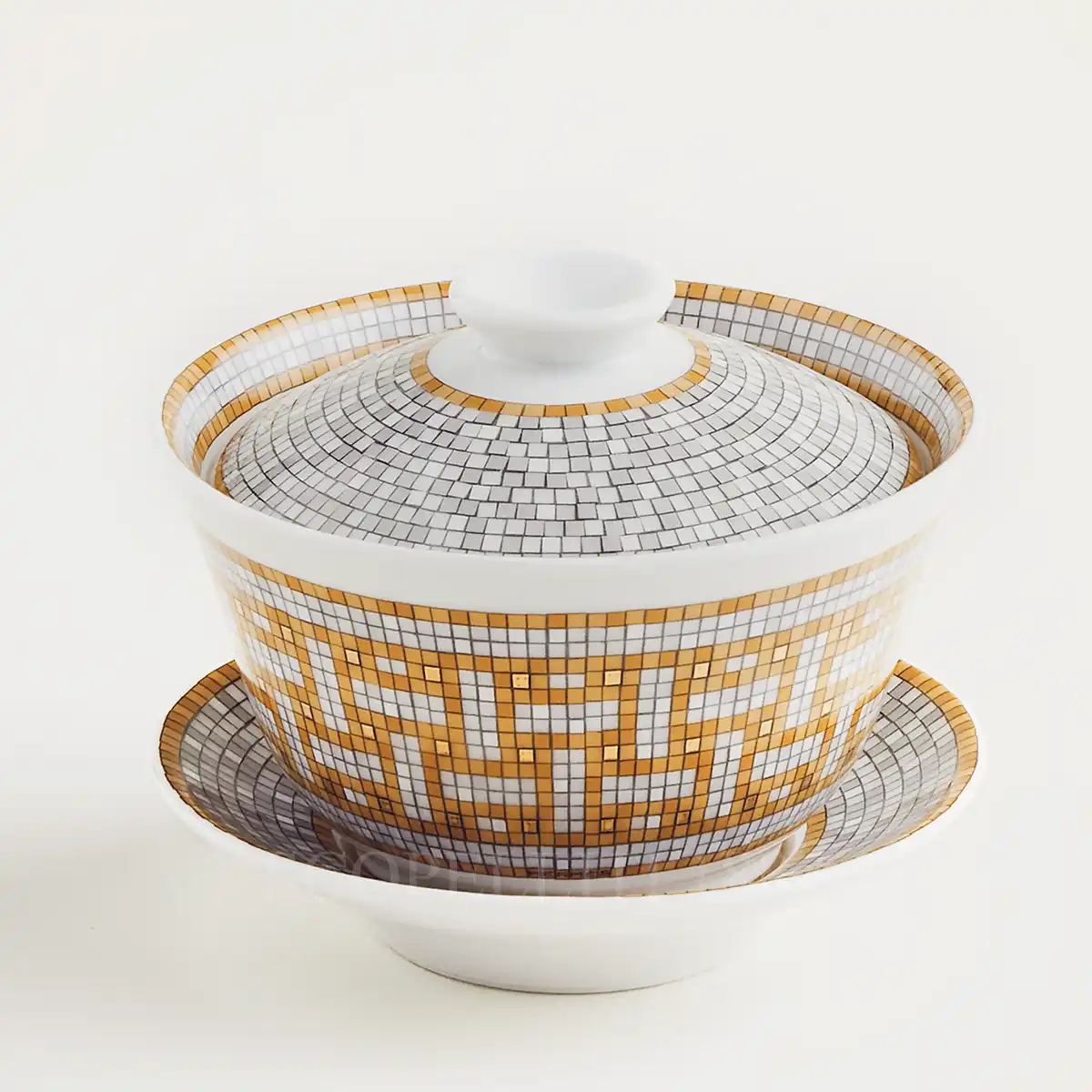 hermès mosaique au 24 lidded tea cup in limoges porcelain with gold mosaic decoration