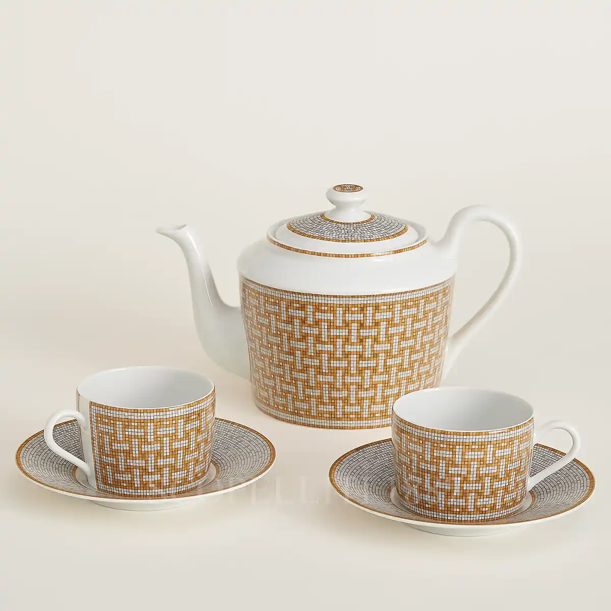 hermès mosaique au 24 tea set with teapot and two tea cups in limoges porcelain with gold mosaic decoration