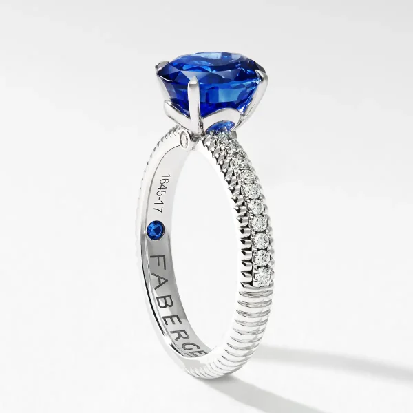 fabergé diamond pavé ring with large blue sapphire