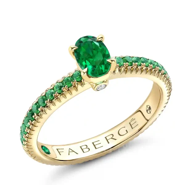 fabergé tsavorite pavé ring with emerald in yellow gold