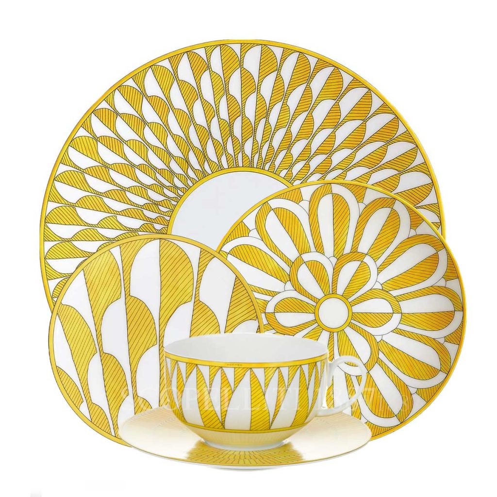 soleil d’hermès limoges porcelain dinner set with vibrant yellow sunburst design