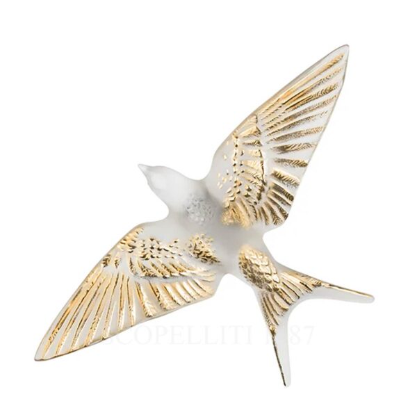 lalique swallow wall sculpture wings down in clear crystal with gold stamping