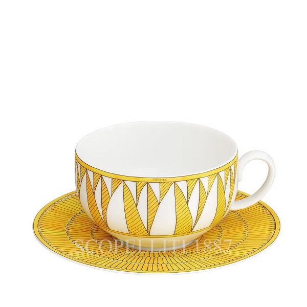soleil d’hermès limoges porcelain tea cup set with radiant yellow sun motif