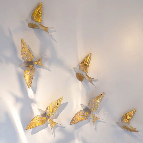 lalique swallows wall sculpture in clear crystal with gold stamping