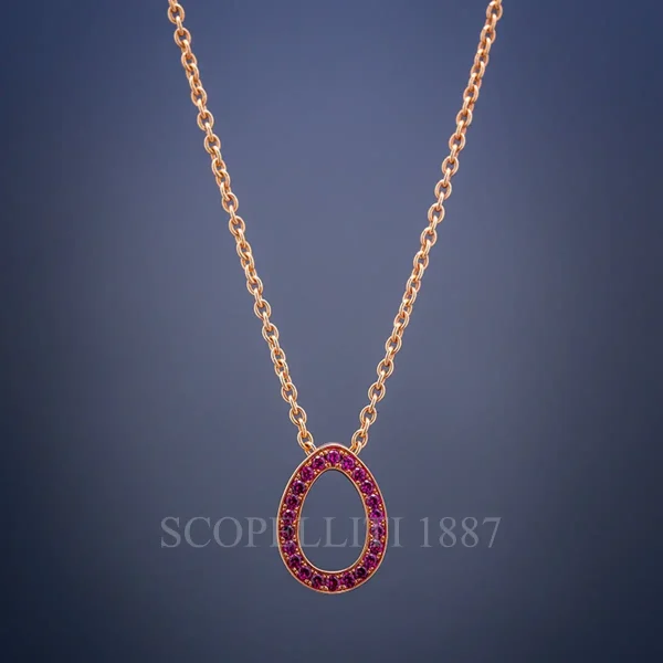 fabergé sasha rose gold ruby egg pendant black background