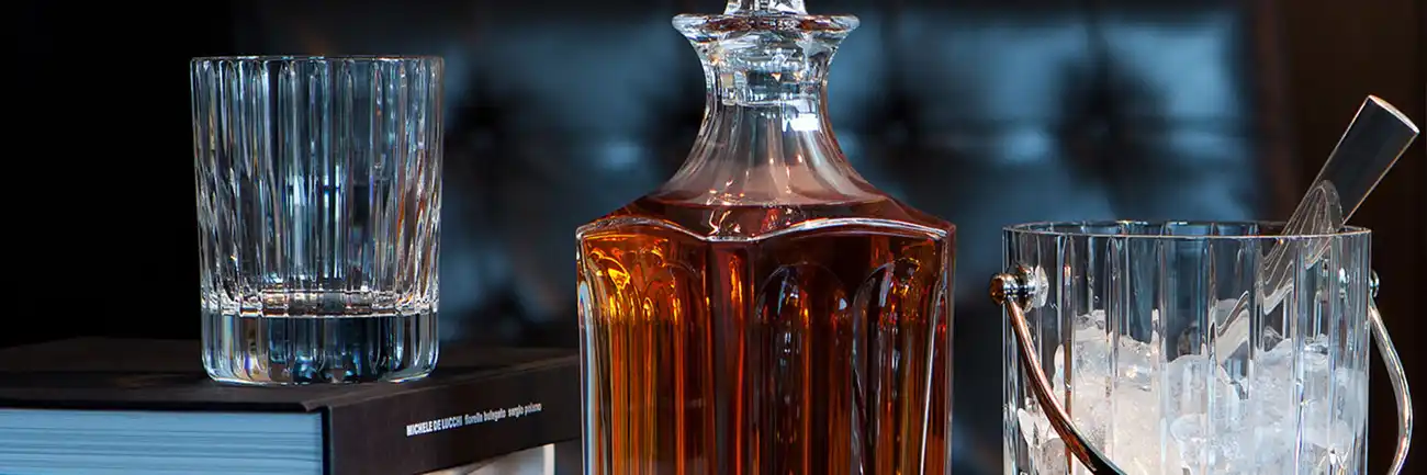 crystal whisky glasses with bottle and ice bucket