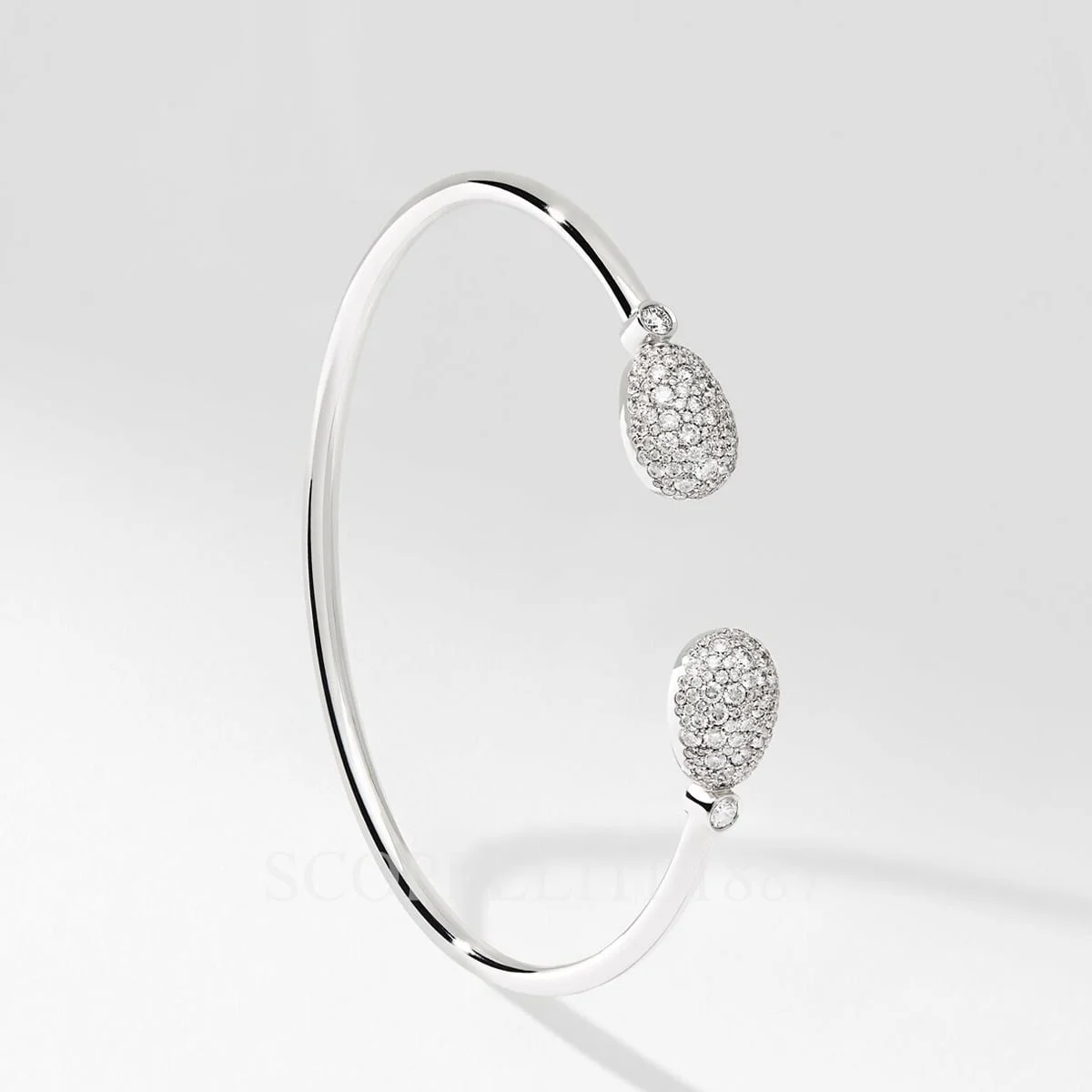 fabergé white gold and diamonds open bracelet