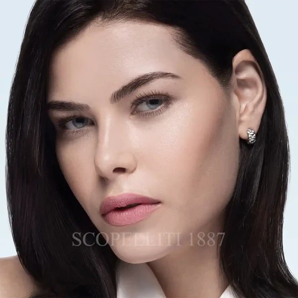 woman wearing fabergé crown diamond hoop earrings white gold