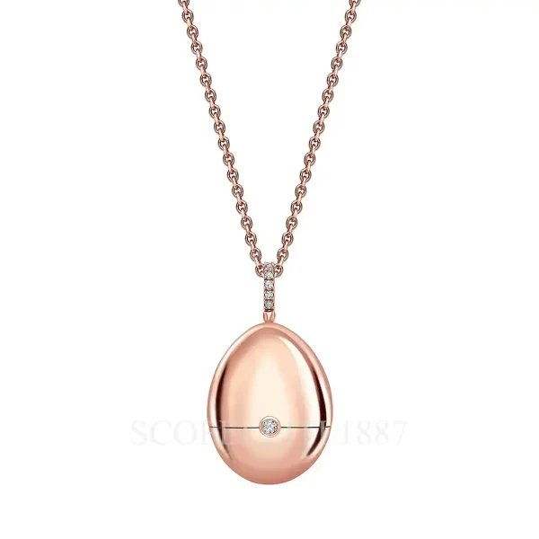 fabergé essence 18kt rose gold ruby set shoe surprise locket closed