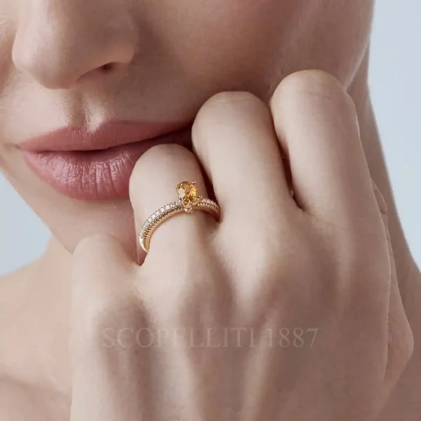 fabergé diamond pavé ring with large yellow sapphire