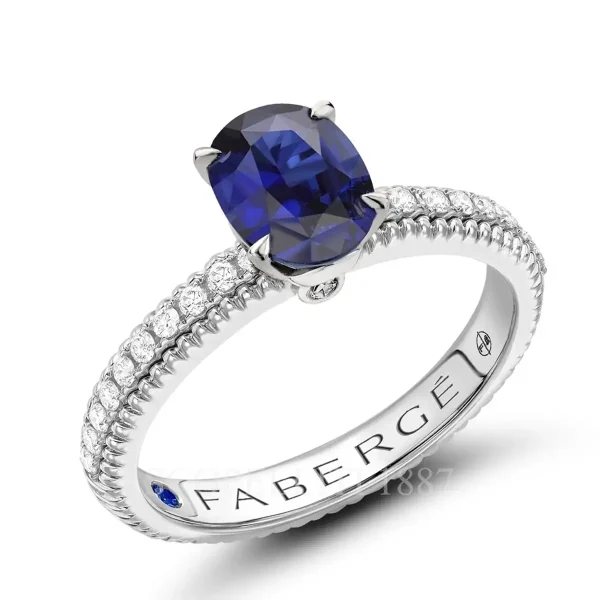 fabergé diamond pavé ring with large blue sapphire