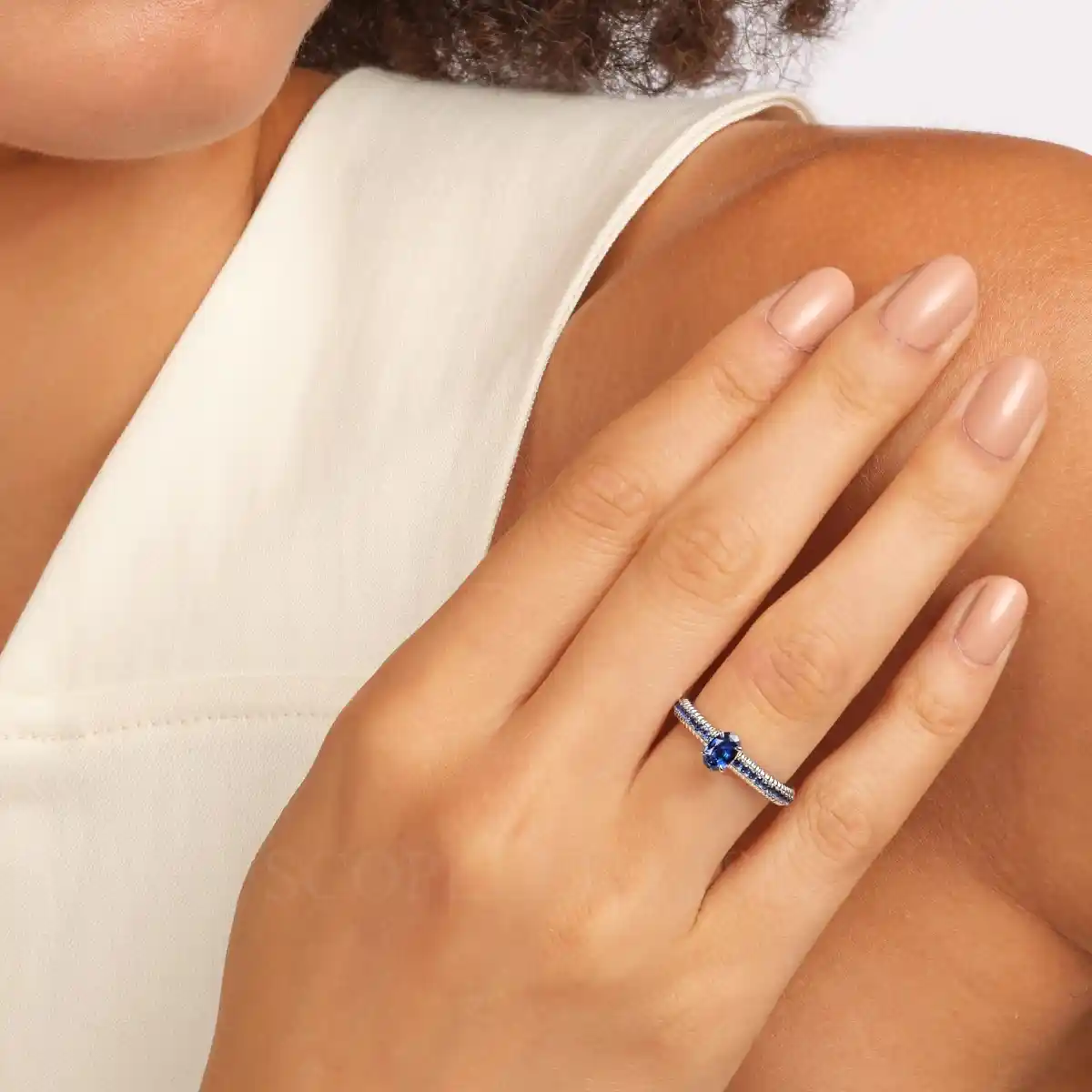 fabergé blue sapphire pavé ring with large oval sapphire