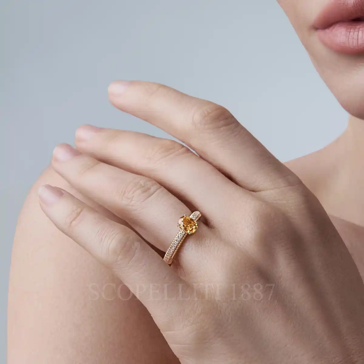 fabergé diamond pavé ring with large yellow sapphire