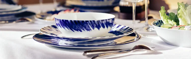 bernardaud table setting with cutlery and plates
