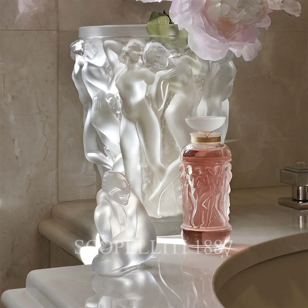lalique nude venus sculpture and bacchantes vase in clear crystal