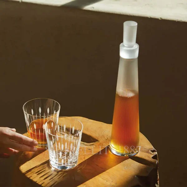 lalique wingen liquor decanter and lotus tumblers