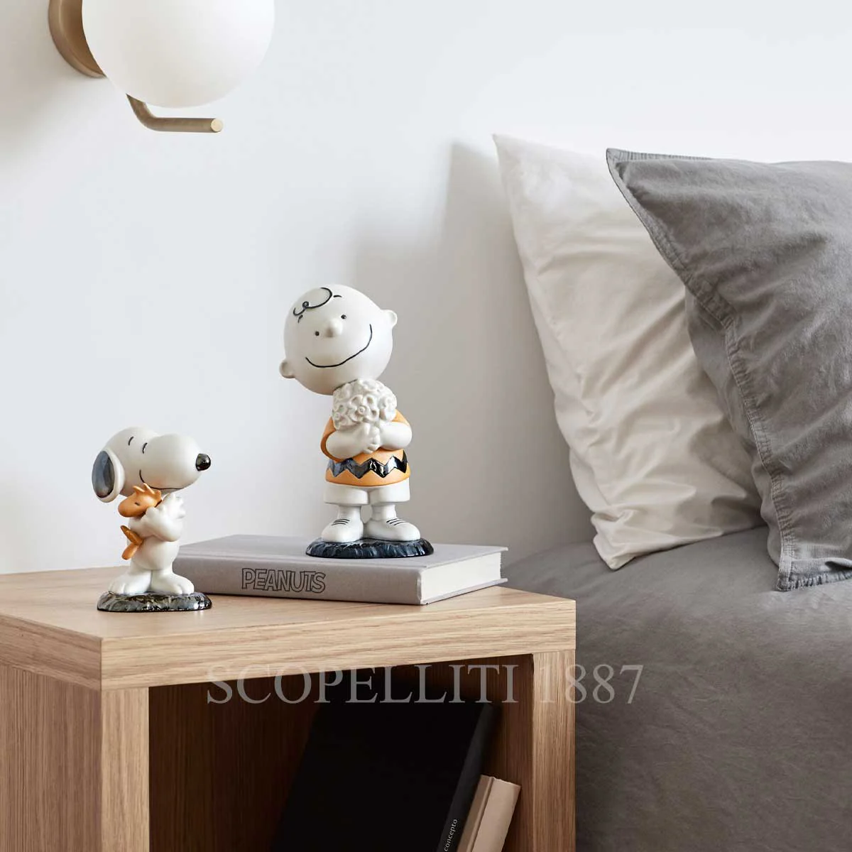 lladro snoopy and charlie brown figurines
