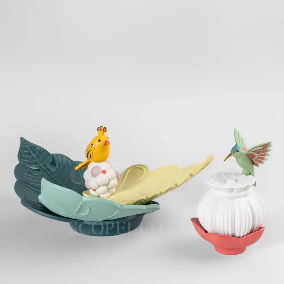 lladro utopical centerpiece with bird and lamp